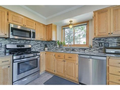 light oak cabinets with stainless steel appliances|oak cabinet makeover.